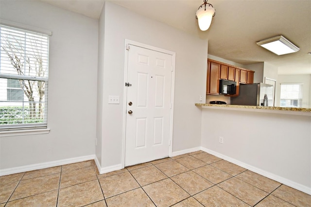 view of tiled foyer