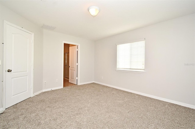 view of carpeted spare room