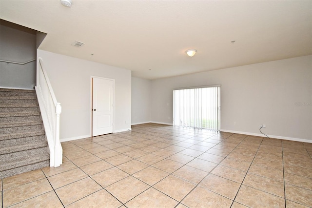 view of tiled spare room