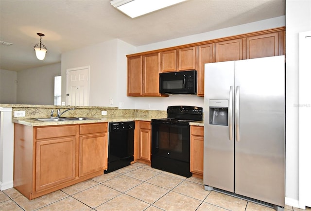 kitchen featuring black appliances, light tile patterned flooring, kitchen peninsula, and sink