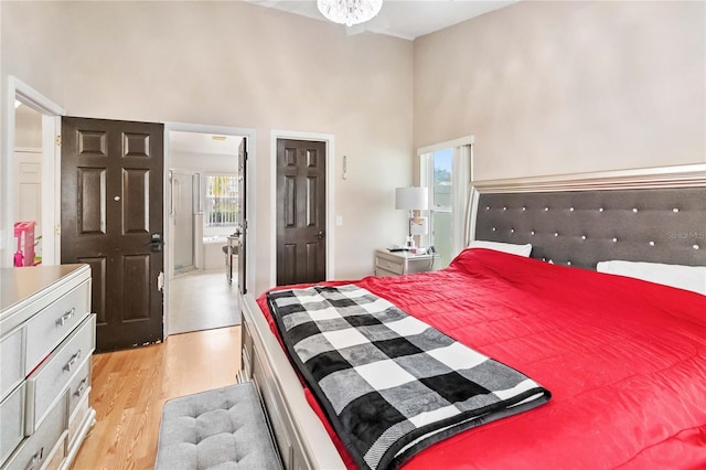 bedroom with light hardwood / wood-style floors