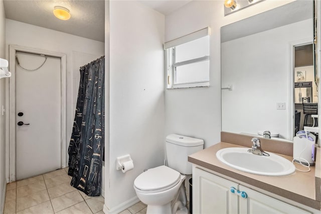 bathroom featuring a shower with curtain, tile patterned flooring, vanity, and toilet