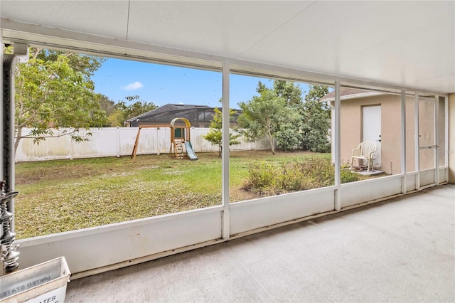 unfurnished sunroom with a wealth of natural light