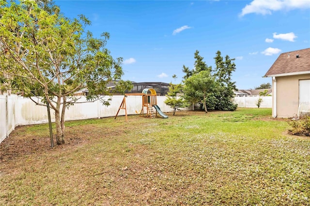 view of yard with a playground