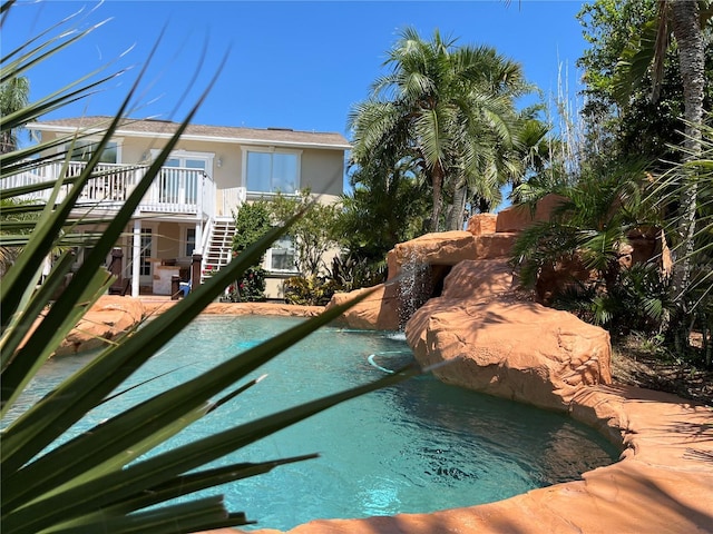 view of pool featuring a deck