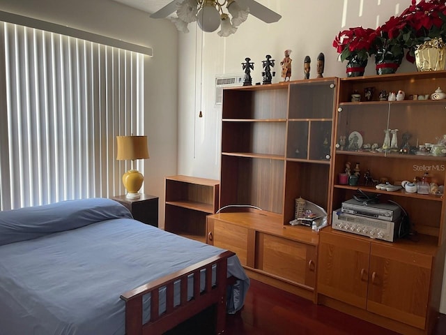 bedroom featuring wood finished floors