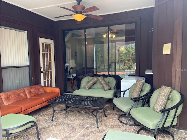 view of patio featuring a ceiling fan