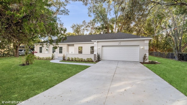 single story home with a front yard and a garage