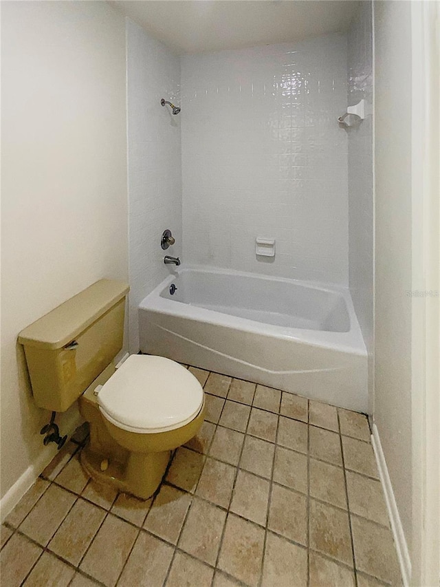 bathroom featuring tile patterned flooring,  shower combination, and toilet