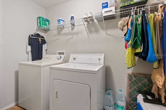 washroom featuring washing machine and dryer