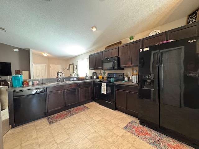 kitchen with dark brown cabinetry, sink, vaulted ceiling, a textured ceiling, and black appliances