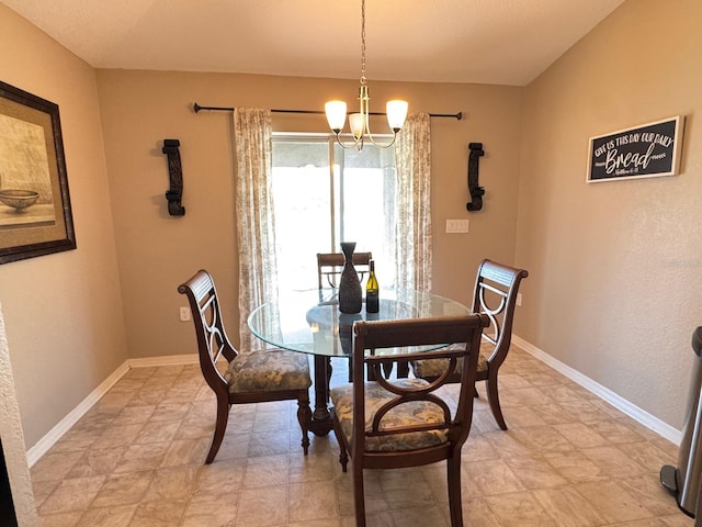 dining room with a wealth of natural light and a notable chandelier