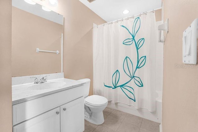 full bathroom with tile patterned floors, vanity, shower / bathtub combination with curtain, and toilet