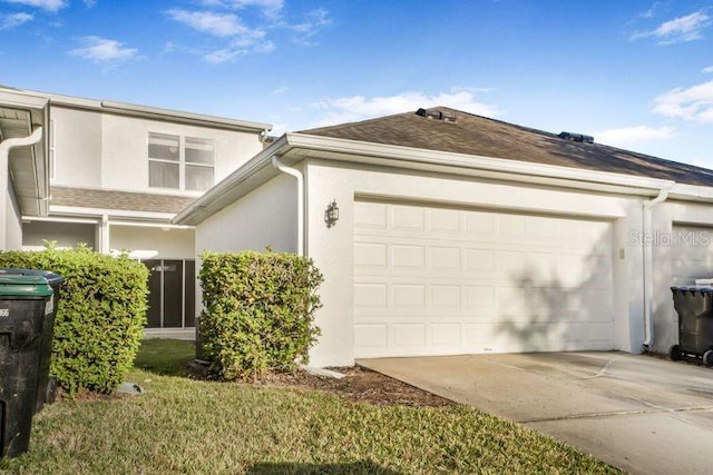 view of property exterior with a garage