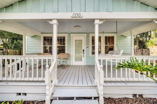 wooden deck featuring covered porch