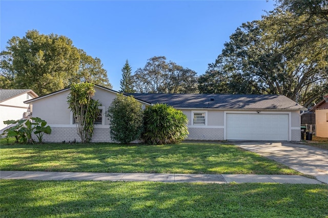 ranch-style home with a garage and a front yard