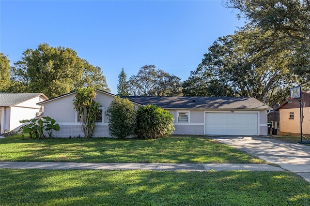 ranch-style home with a garage and a front yard