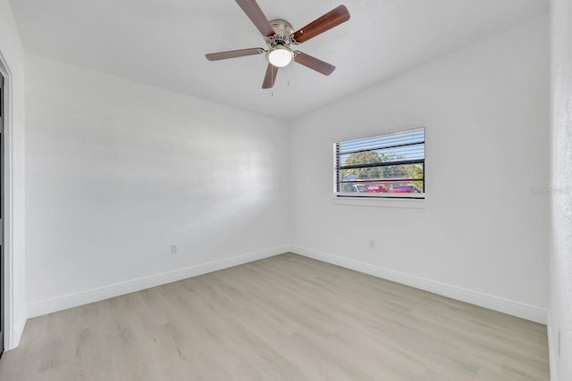 empty room with light hardwood / wood-style floors and ceiling fan