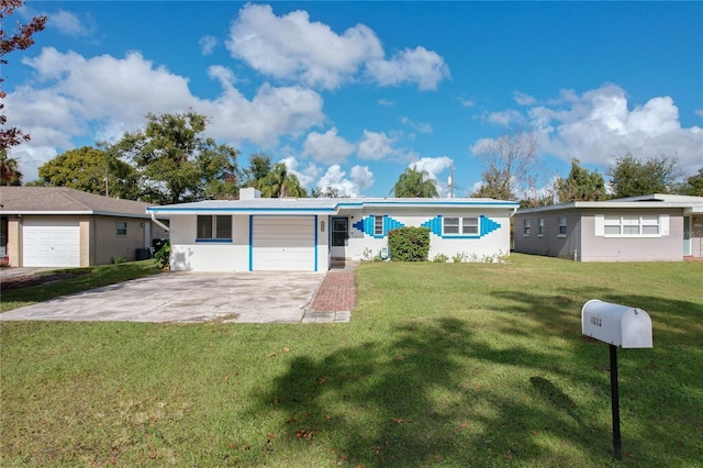 single story home featuring a garage and a front lawn