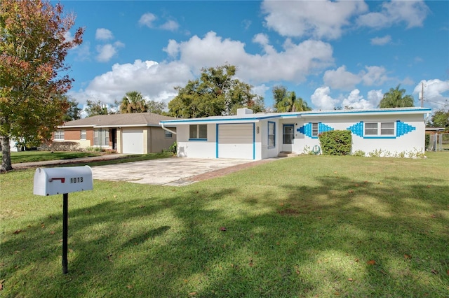 single story home featuring a garage and a front lawn