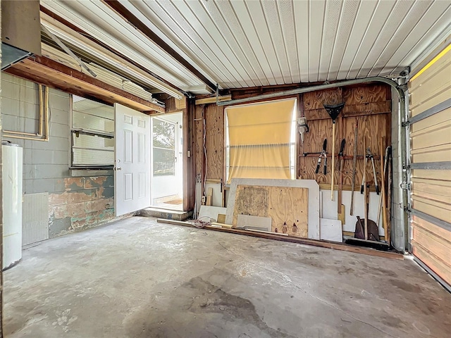 garage featuring water heater