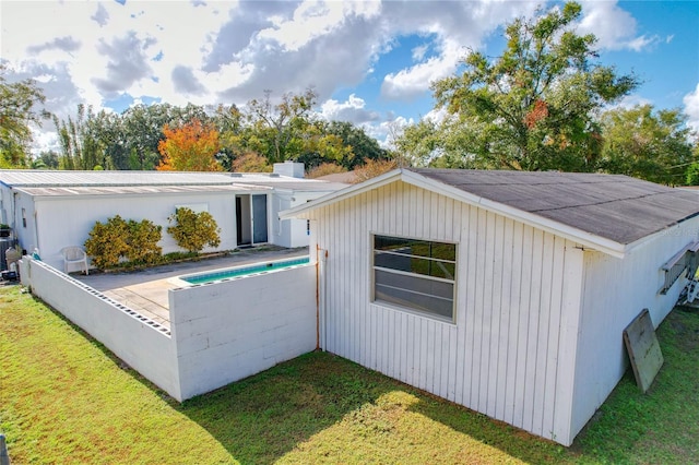 exterior space featuring a yard