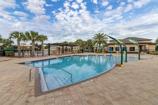 view of swimming pool featuring a patio area