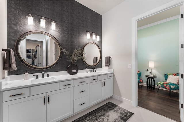 bathroom featuring hardwood / wood-style floors and vanity