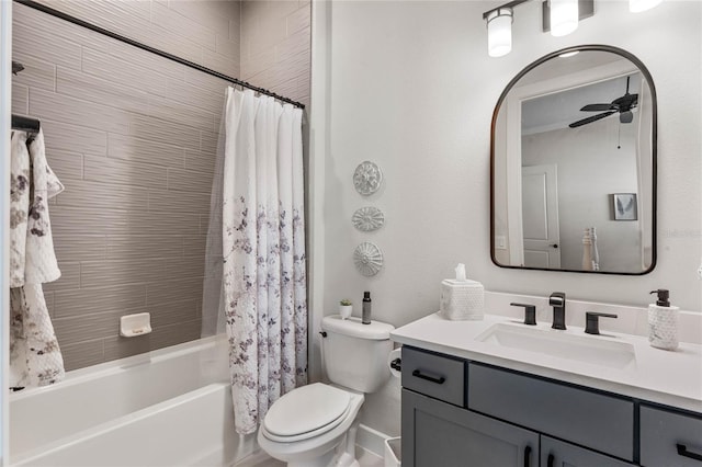 full bathroom with ceiling fan, toilet, vanity, and shower / tub combo with curtain