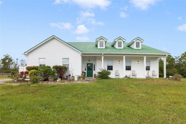 view of front of home with a front lawn