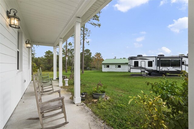 view of yard featuring a porch