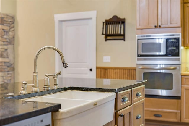 kitchen featuring appliances with stainless steel finishes and sink