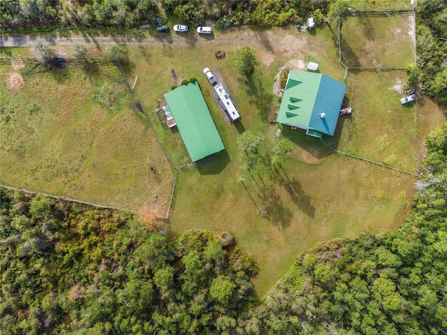 birds eye view of property featuring a rural view