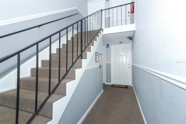 staircase with carpet