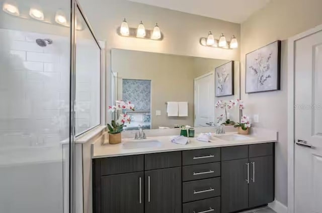 bathroom with vanity and walk in shower