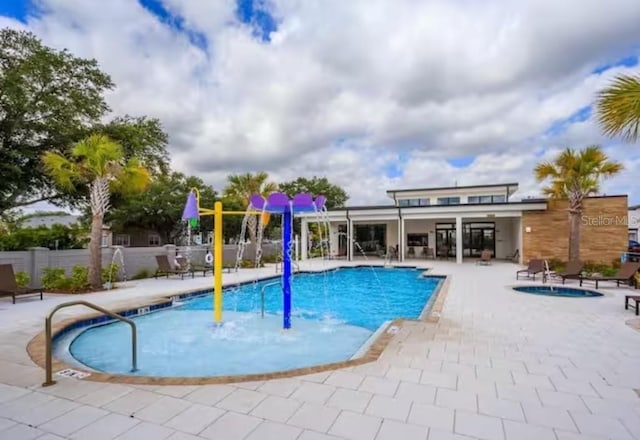 view of pool featuring a patio area