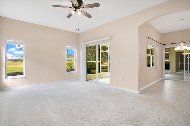 spare room with light colored carpet and a wealth of natural light