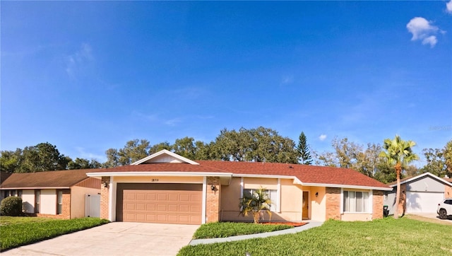 1859 Lake Hill Cir, Orlando, FL 32818 - single story home with an attached garage, a front yard, driveway, and brick siding