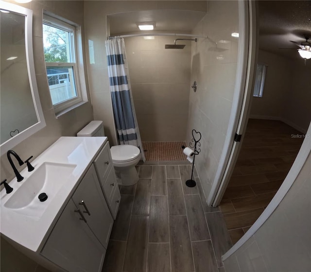 1859 Lake Hill Cir, Orlando, FL 32818 - full bath with wood tiled floors, vanity, and a tile shower