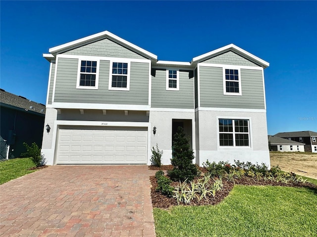 front of property with a garage