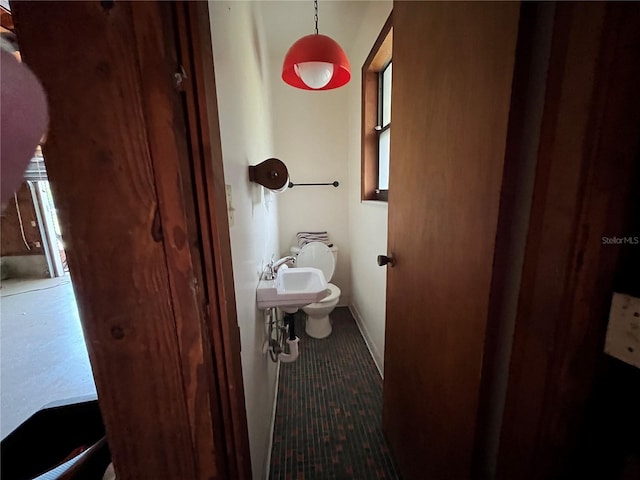 bathroom featuring toilet