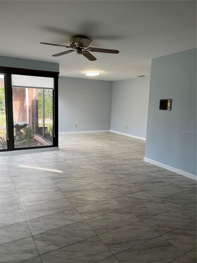 unfurnished room featuring ceiling fan