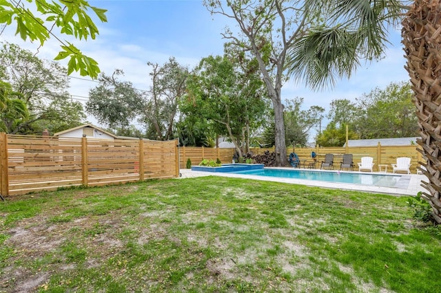 view of yard with a fenced in pool and a fenced backyard