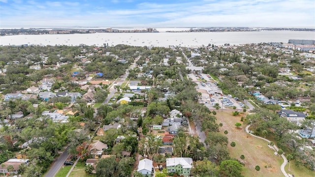 bird's eye view with a water view and a residential view