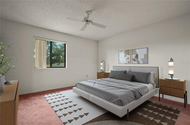 carpeted bedroom featuring ceiling fan and a textured ceiling