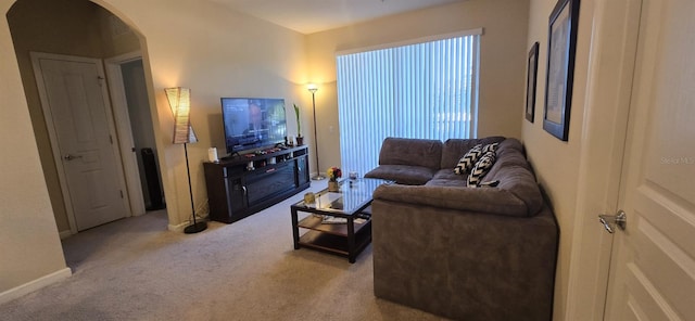 living room with light colored carpet