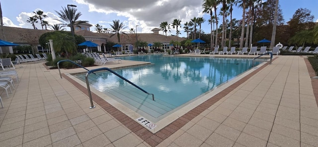 view of pool featuring a patio area