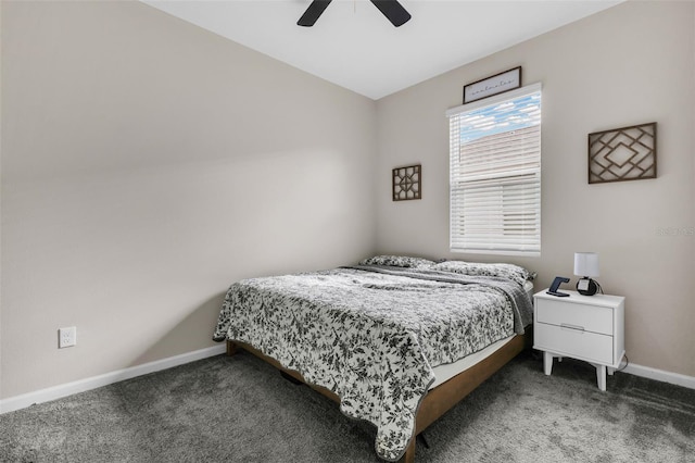 bedroom with ceiling fan and dark colored carpet