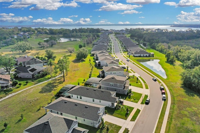 aerial view with a water view and a residential view