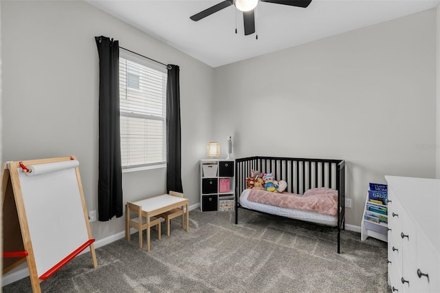 bedroom with carpet, a ceiling fan, and baseboards